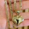 Cuban chain, brilliant cut, and 10k gold heart pendant